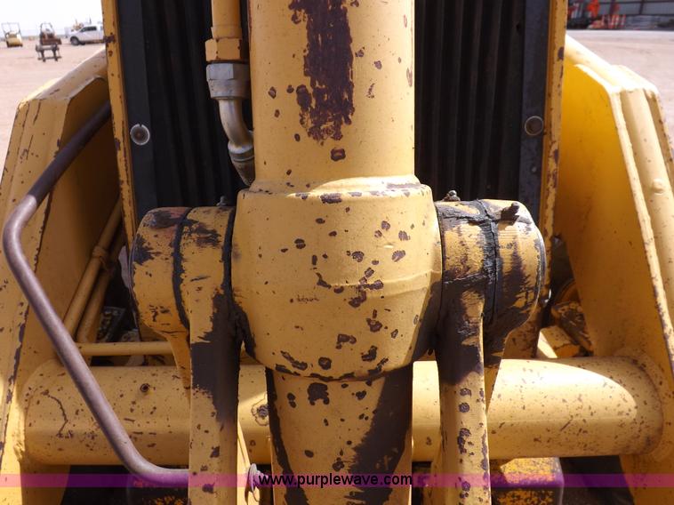 image for item I9005 1993 John Deere 710D backhoe