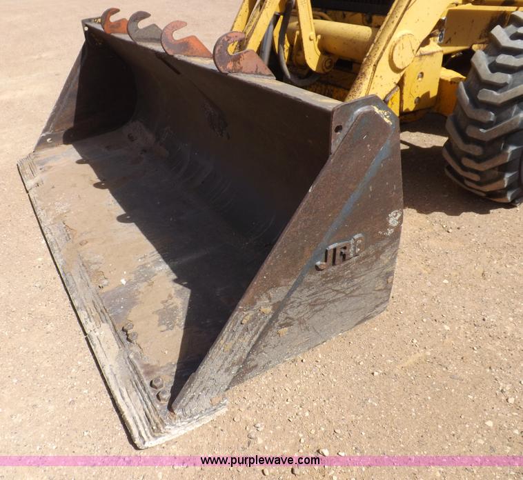 image for item I9005 1993 John Deere 710D backhoe