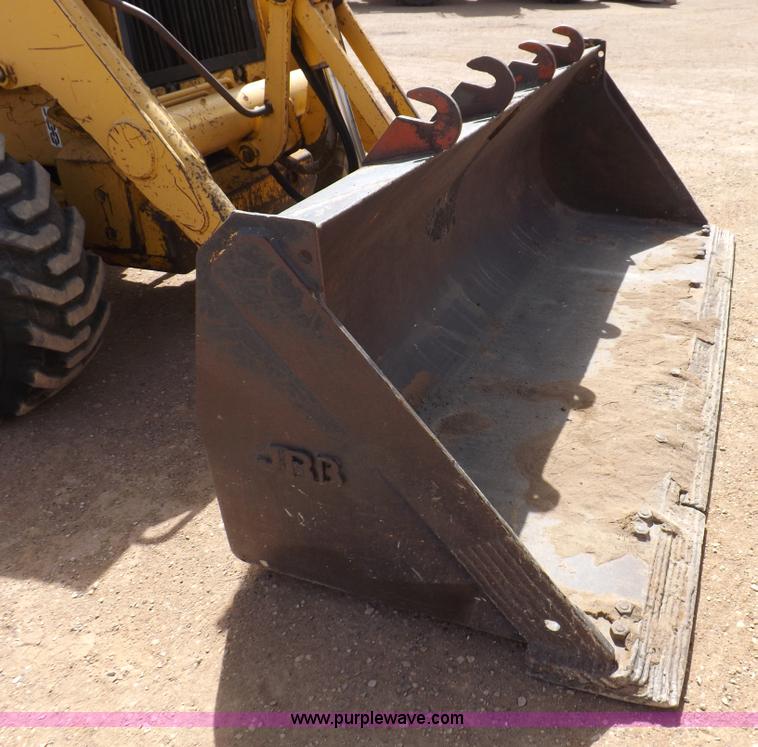 image for item I9005 1993 John Deere 710D backhoe