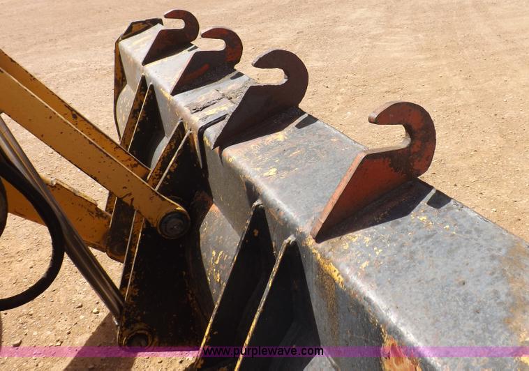 image for item I9005 1993 John Deere 710D backhoe