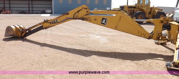 image for item I9005 1993 John Deere 710D backhoe