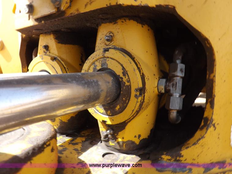 image for item I9005 1993 John Deere 710D backhoe