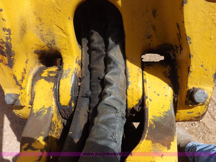 image for item I9005 1993 John Deere 710D backhoe