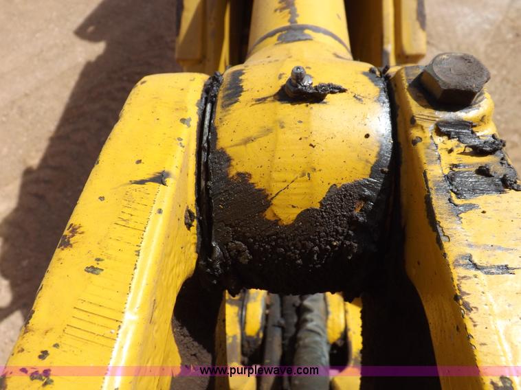 image for item I9005 1993 John Deere 710D backhoe