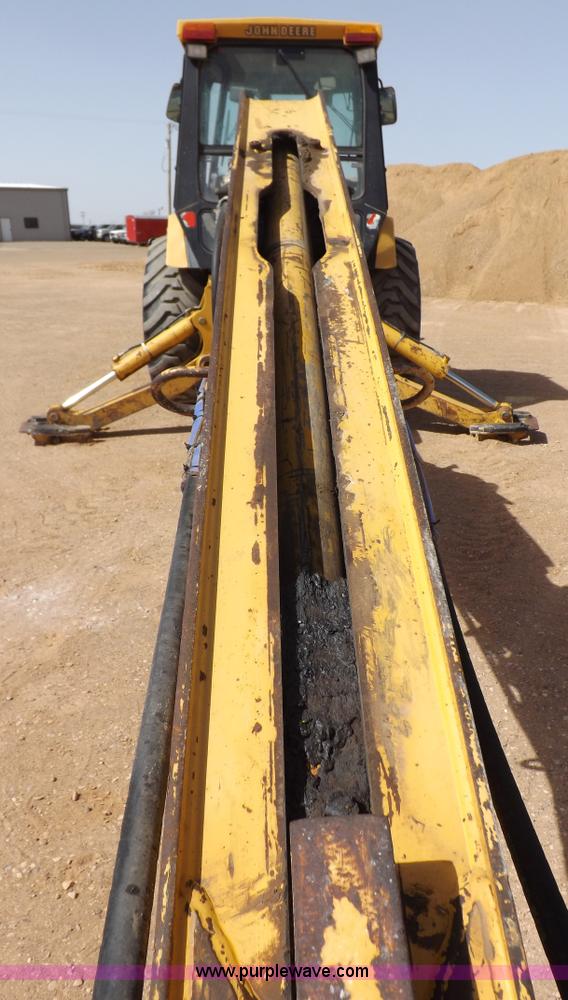 image for item I9005 1993 John Deere 710D backhoe