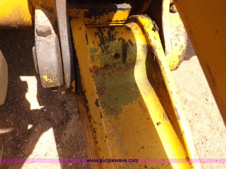 image for item I9005 1993 John Deere 710D backhoe