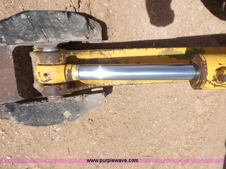 image for item I9005 1993 John Deere 710D backhoe