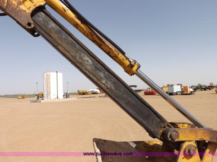 image for item I9005 1993 John Deere 710D backhoe