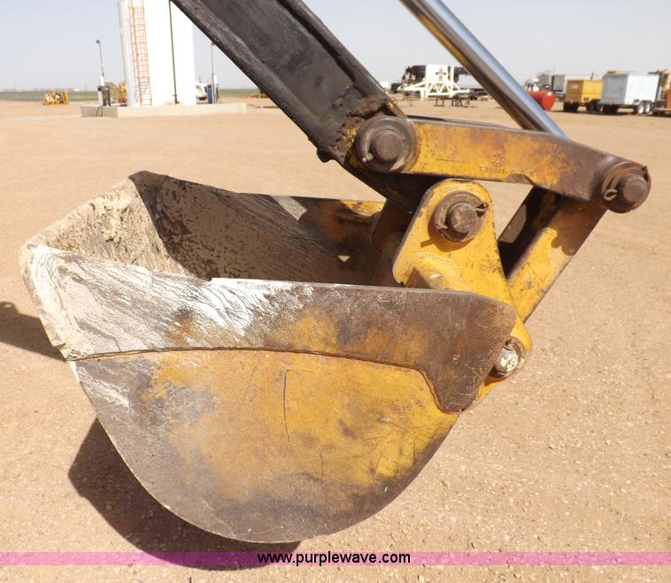 image for item I9005 1993 John Deere 710D backhoe