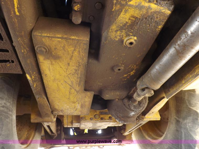 image for item I9005 1993 John Deere 710D backhoe