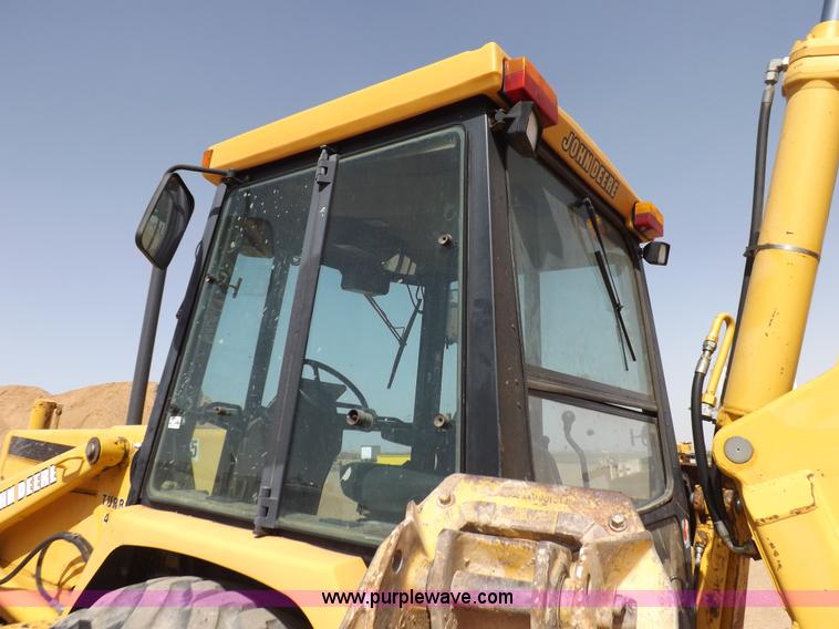 image for item I9005 1993 John Deere 710D backhoe