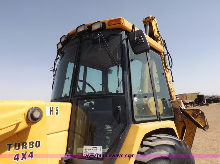 image for item I9005 1993 John Deere 710D backhoe