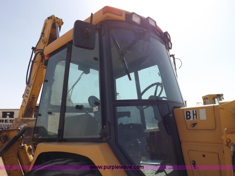 image for item I9005 1993 John Deere 710D backhoe