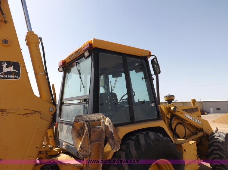 image for item I9005 1993 John Deere 710D backhoe