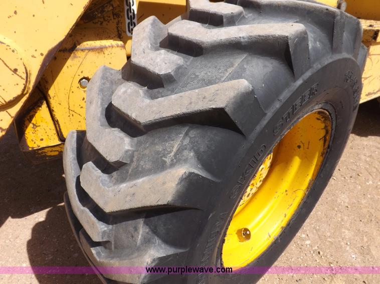 image for item I9005 1993 John Deere 710D backhoe