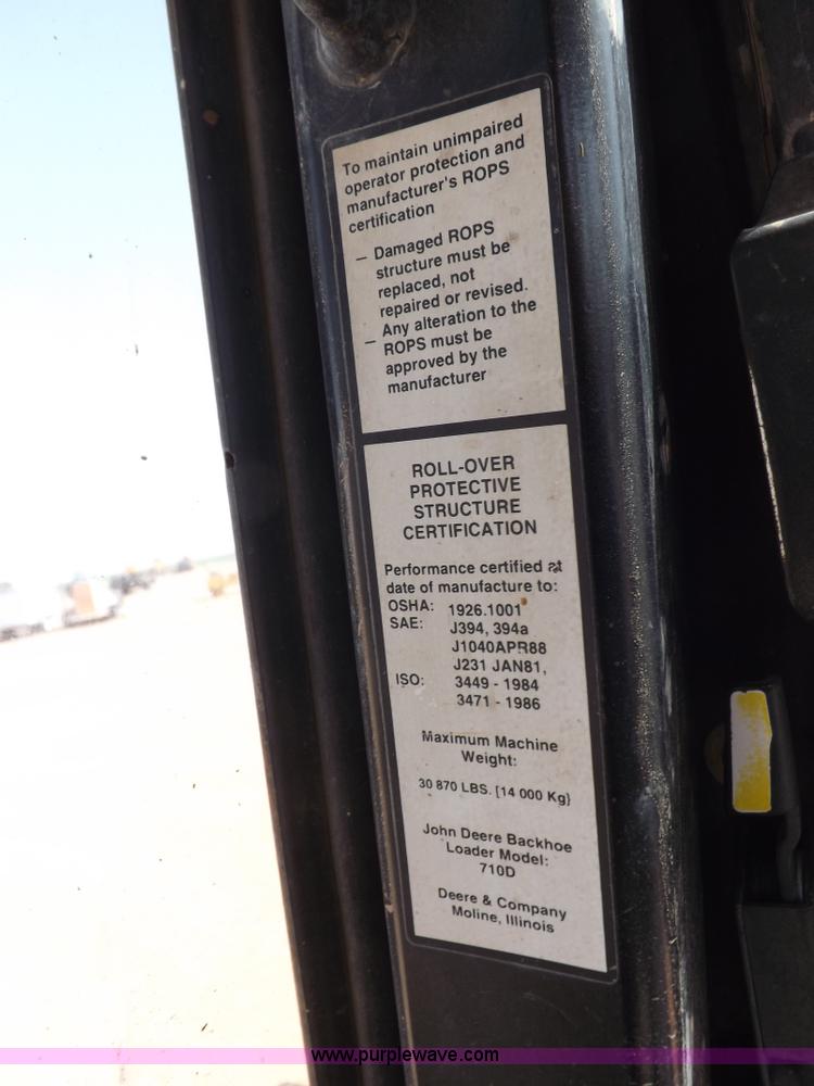 image for item I9005 1993 John Deere 710D backhoe