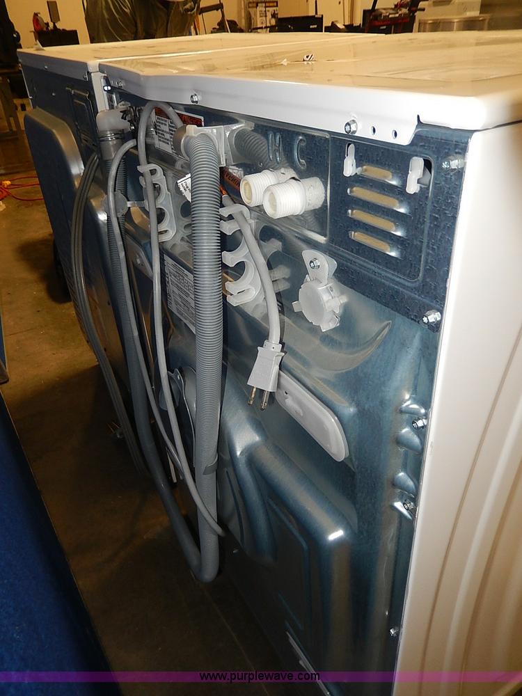 Whirlpool Duet front load washer and dryer set in Manhattan, KS Item AX9119 sold Purple Wave