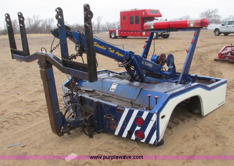 Tow truck bed in Wichita, KS Item AX9860 sold Purple Wave