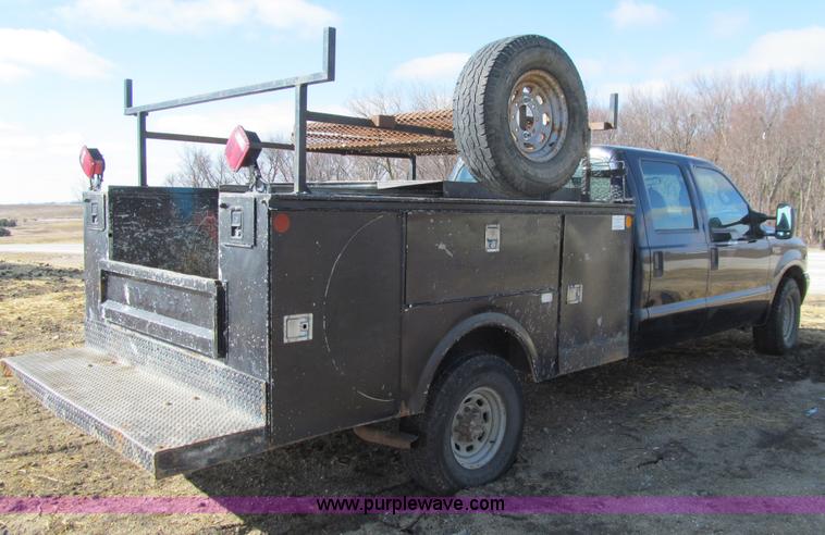 image for item E4675 2000 Ford F350 Super Duty XL Crew Cab utility truck