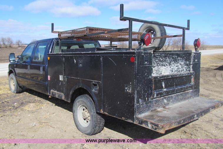 image for item E4675 2000 Ford F350 Super Duty XL Crew Cab utility truck