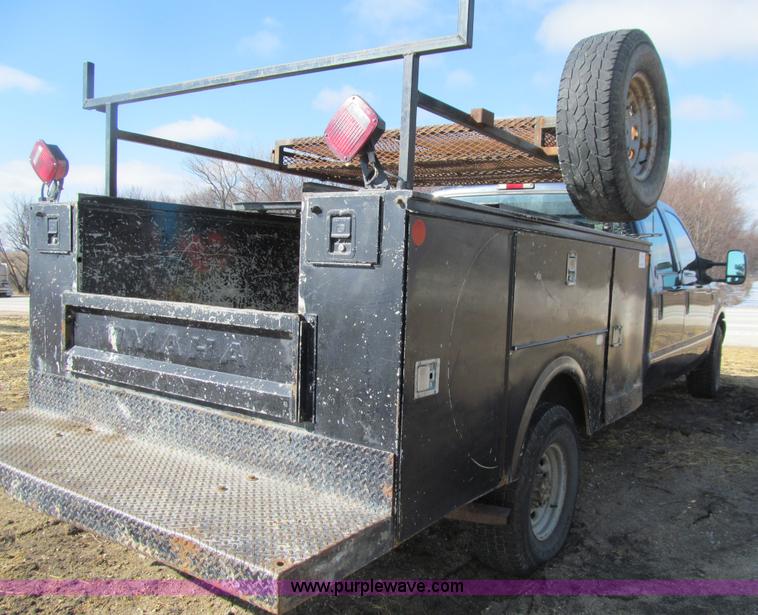 image for item E4675 2000 Ford F350 Super Duty XL Crew Cab utility truck