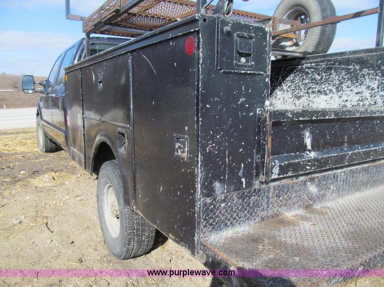 image for item E4675 2000 Ford F350 Super Duty XL Crew Cab utility truck