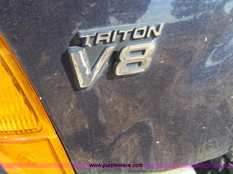 image for item E4675 2000 Ford F350 Super Duty XL Crew Cab utility truck