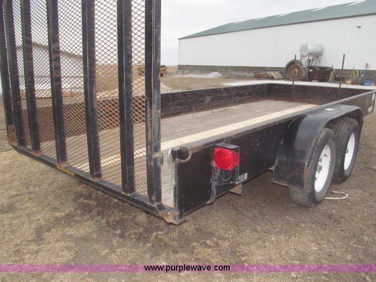 image for item F7329 2005 H&H tandem axle trailer