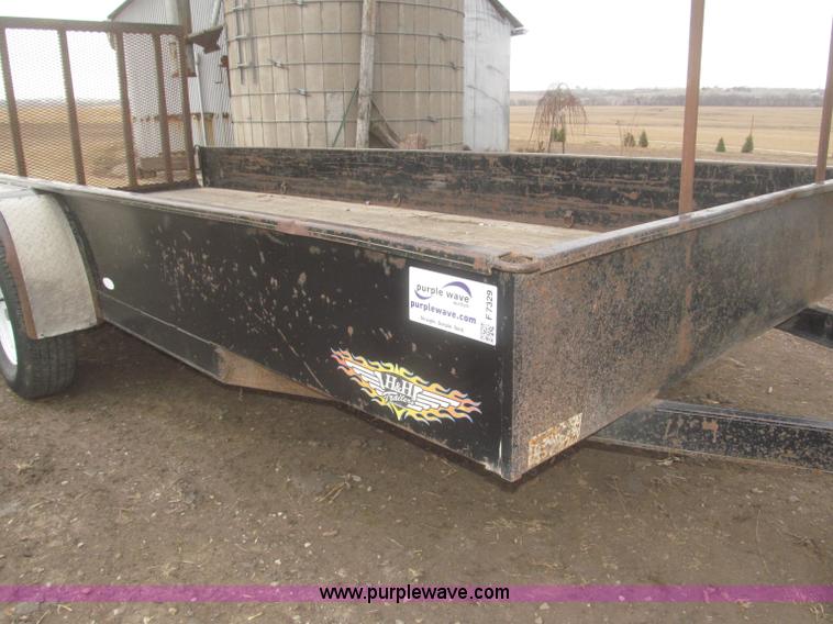 image for item F7329 2005 H&H tandem axle trailer