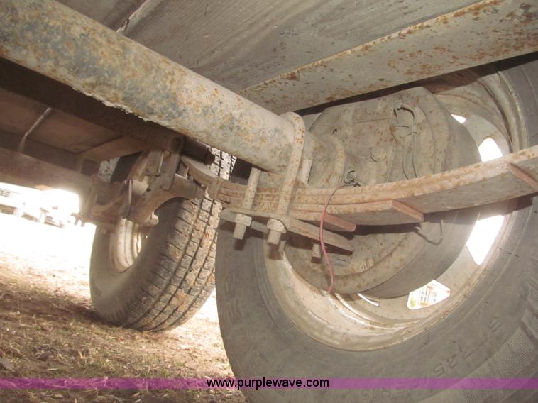 image for item F7329 2005 H&H tandem axle trailer