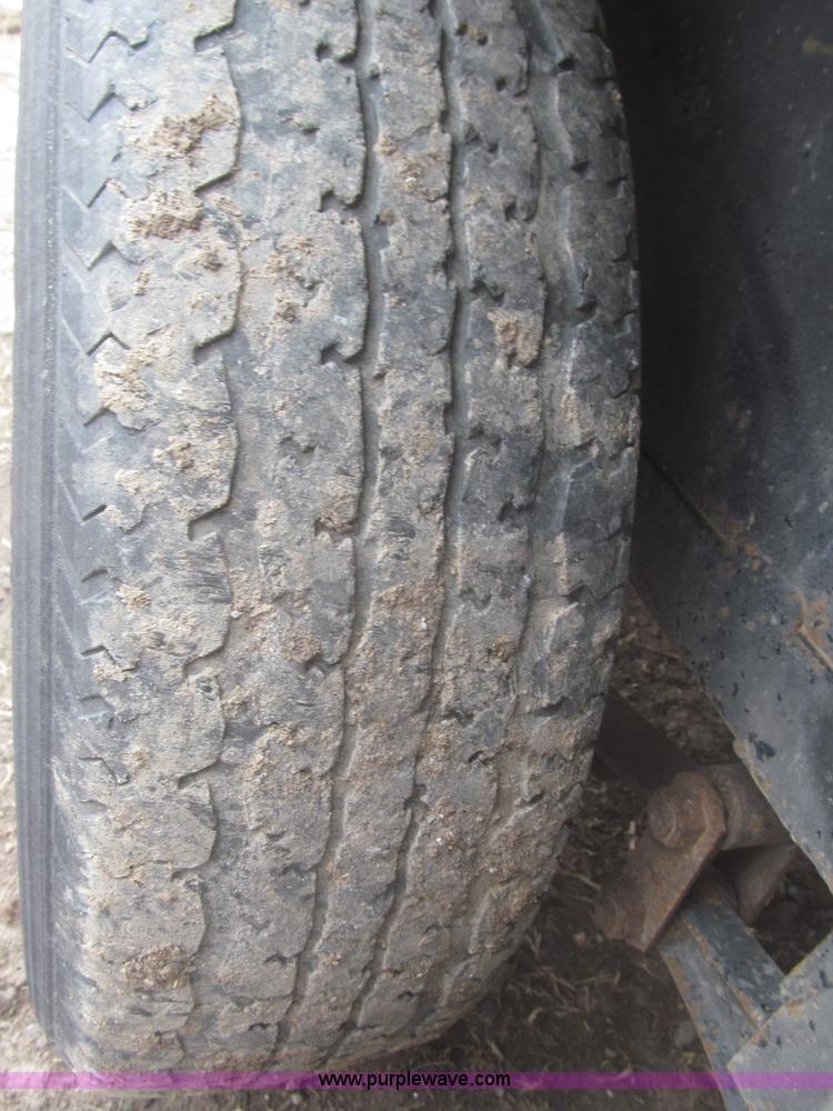 image for item F7329 2005 H&H tandem axle trailer