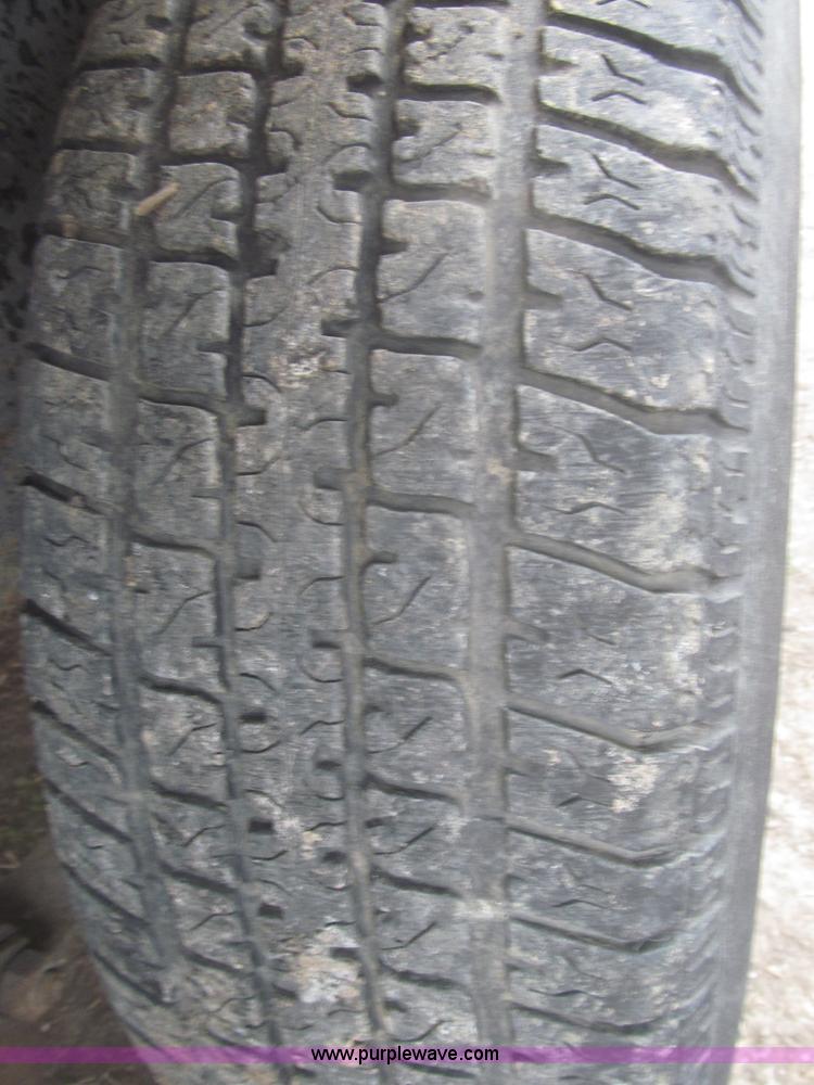 image for item F7329 2005 H&H tandem axle trailer