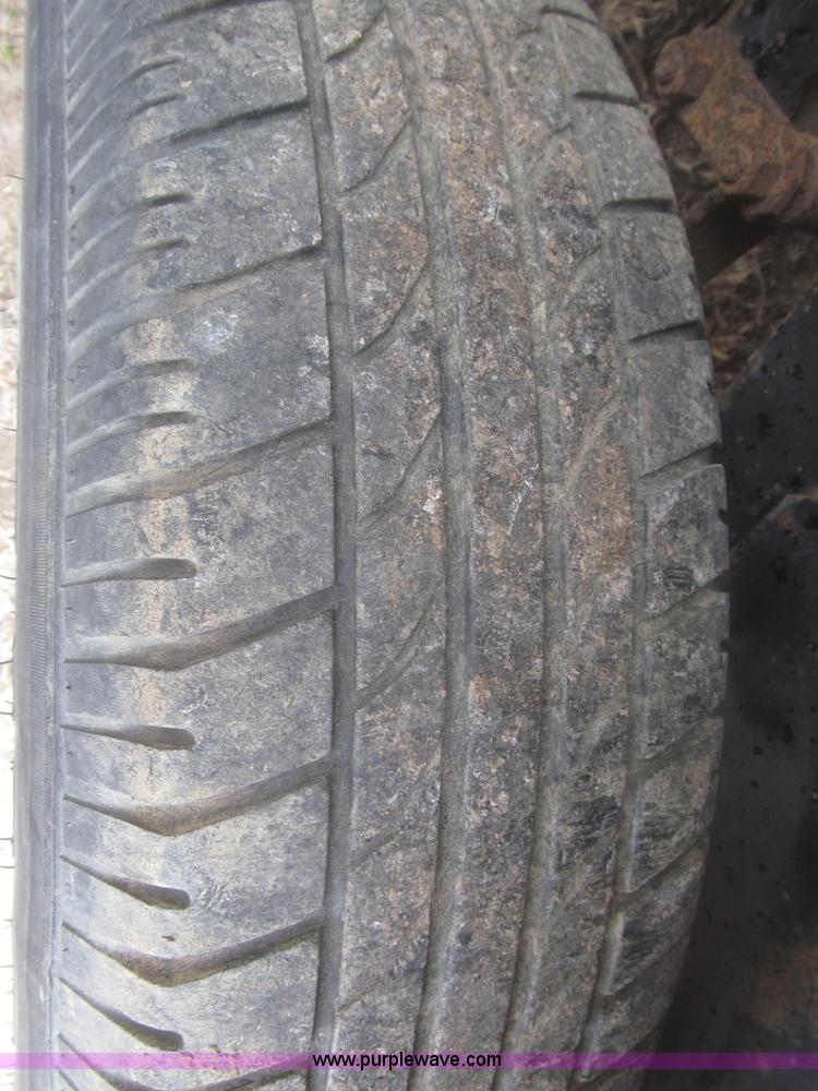 image for item F7329 2005 H&H tandem axle trailer