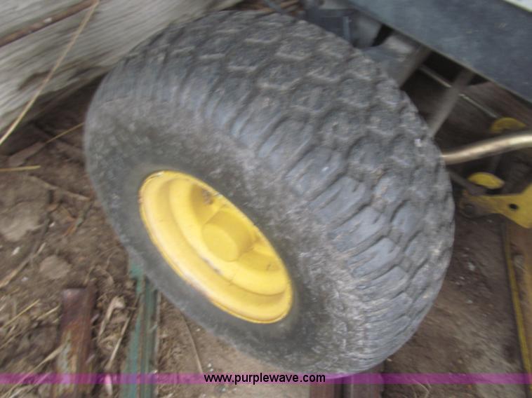 image for item F7330 John Deere LX176 riding lawn mower