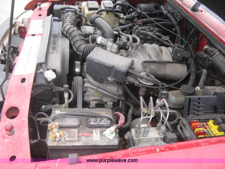 image for item G8472 2000 Ford Ranger XLT SuperCab flatbed pickup truck