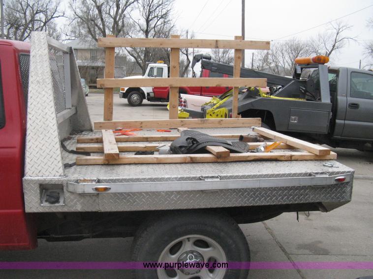 image for item G8472 2000 Ford Ranger XLT SuperCab flatbed pickup truck
