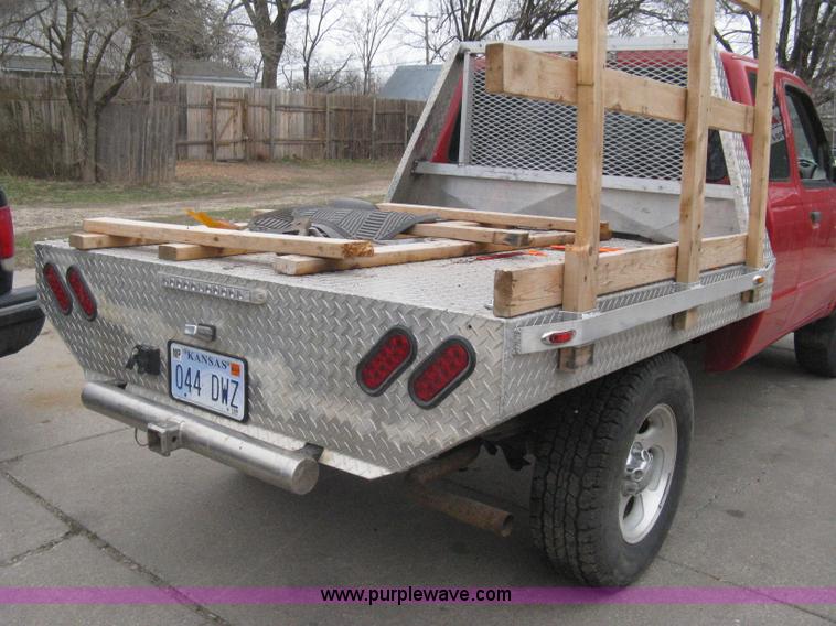 image for item G8472 2000 Ford Ranger XLT SuperCab flatbed pickup truck