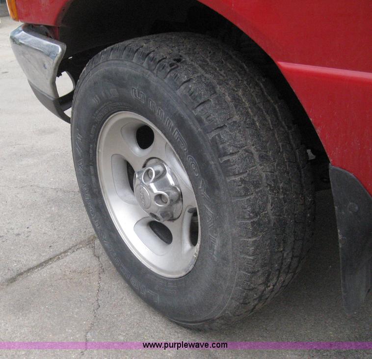 image for item G8472 2000 Ford Ranger XLT SuperCab flatbed pickup truck