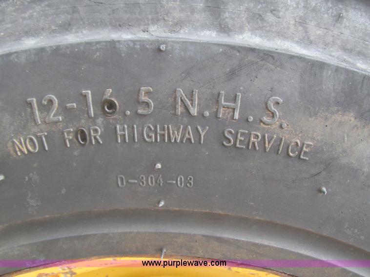 image for item G9334 2000 New Holland LS180 skid steer