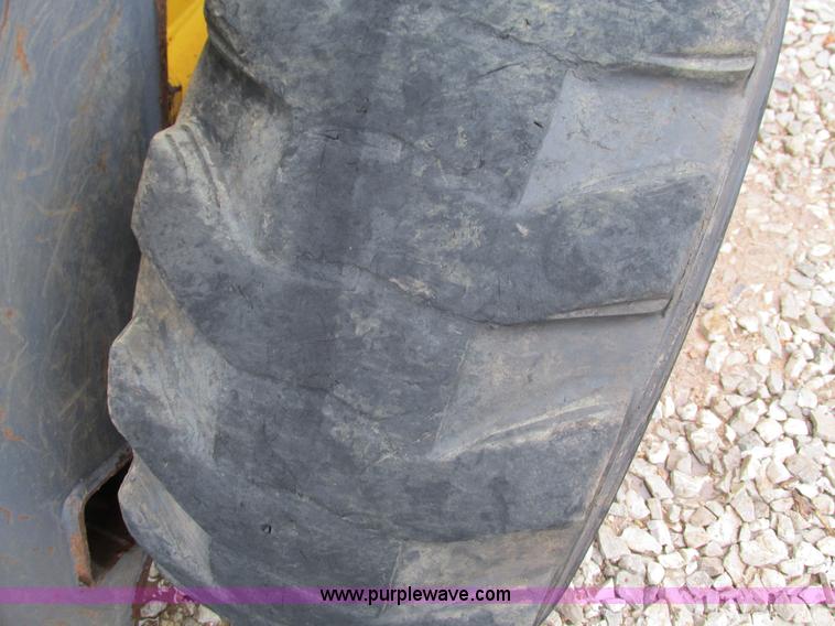 image for item G9334 2000 New Holland LS180 skid steer