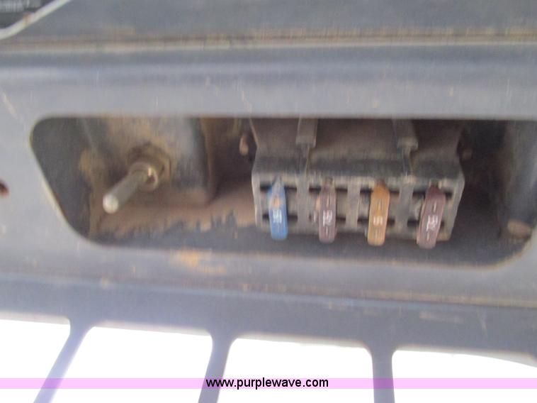 image for item G9334 2000 New Holland LS180 skid steer