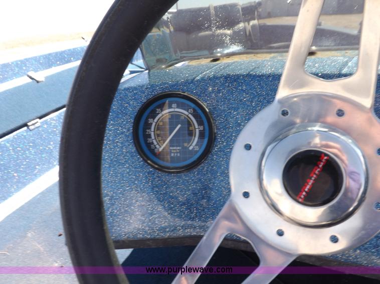 image for item H1955 1986 Ebb Tide Dyna Trac boat