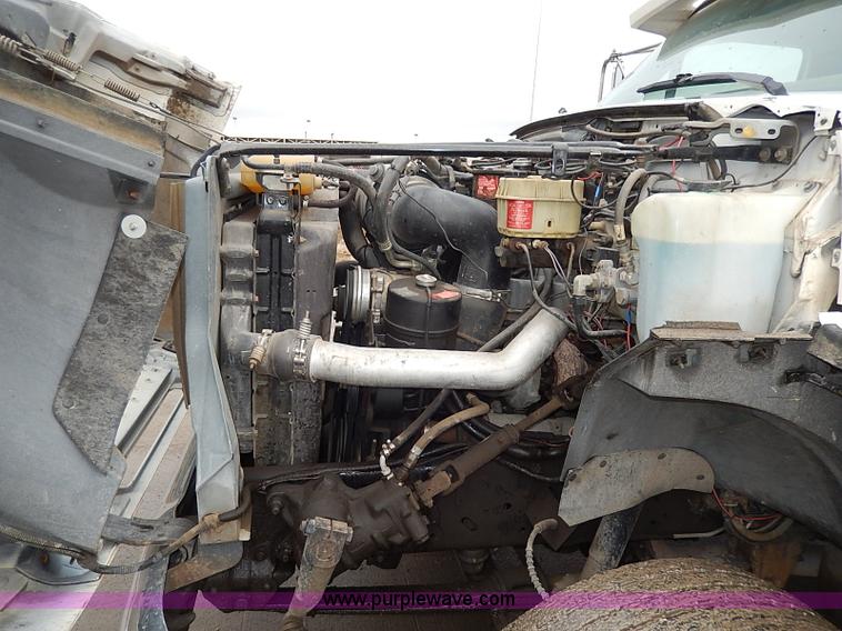 image for item H6186 1990 Ford F700 Crew Cab flatbed truck