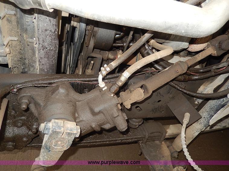 image for item H6186 1990 Ford F700 Crew Cab flatbed truck