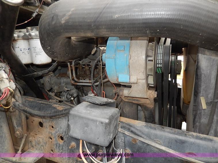 image for item H6186 1990 Ford F700 Crew Cab flatbed truck