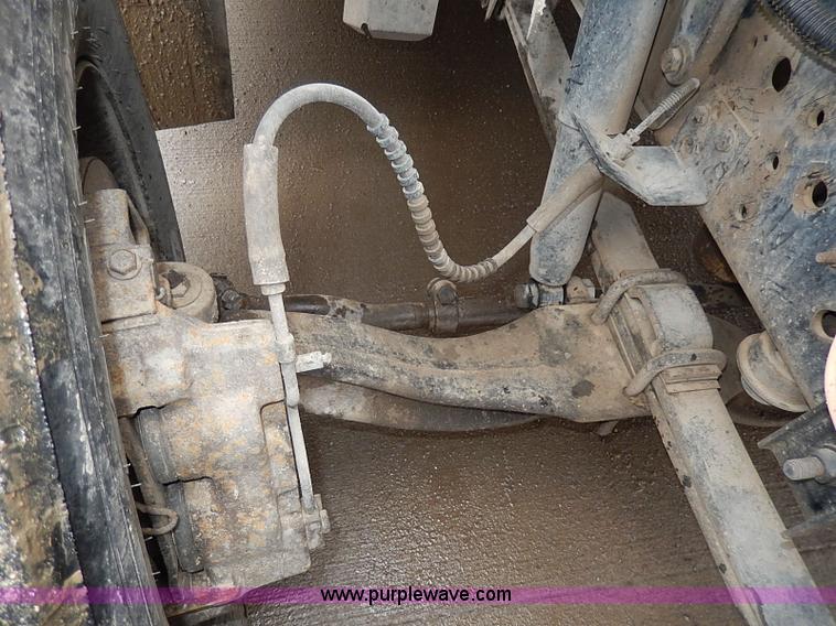 image for item H6186 1990 Ford F700 Crew Cab flatbed truck