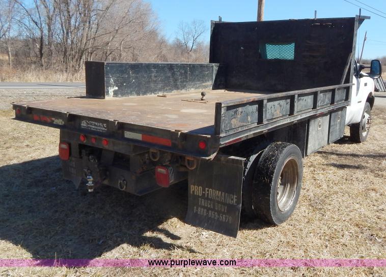 image for item I1117 1999 Ford F450 flatbed truck