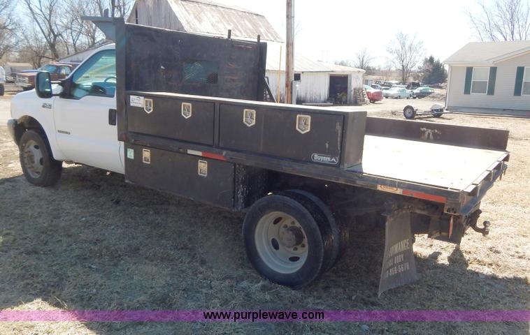 image for item I1117 1999 Ford F450 flatbed truck