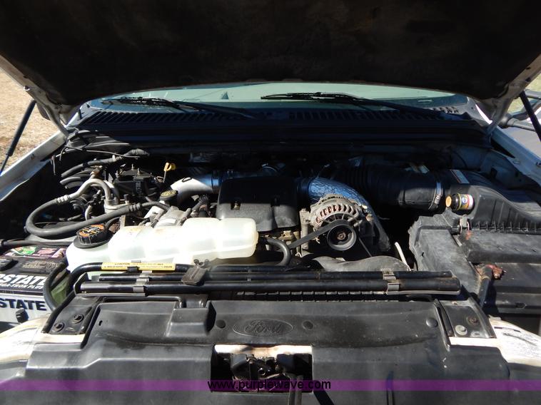 image for item I1117 1999 Ford F450 flatbed truck