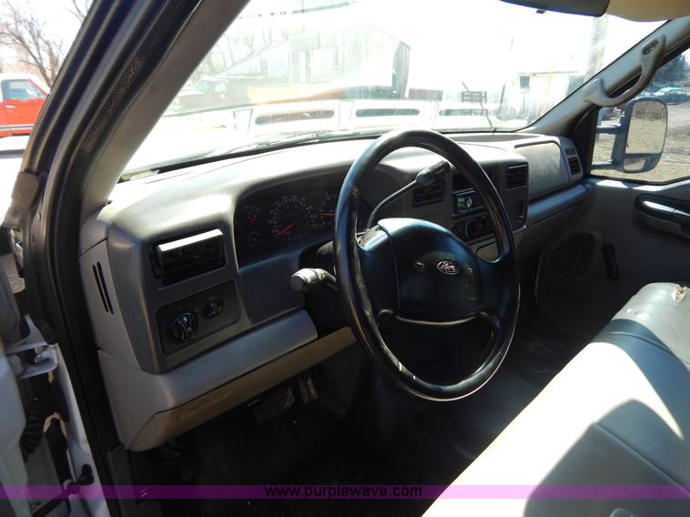 image for item I1117 1999 Ford F450 flatbed truck